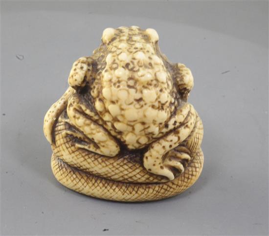 A Japanese ivory netsuke of the sansukumi (snake, frog and snail), 19th century, signed, 4cm (no. 592)